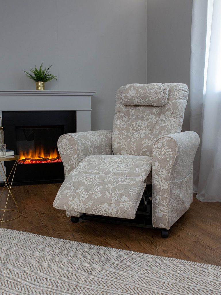 The Windsor riser recliner armchair, with the footrest raised.