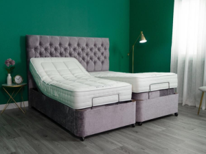 Dual adjustable bed in different positions.